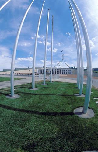 16 Parliament House Canberra Through Flagpoles - Australia BPM DVD 2 Parliament House Canberra Flagpoles 