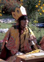 Yellow Hat Monk with Hand Bell 